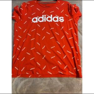 A red adidas t shirt